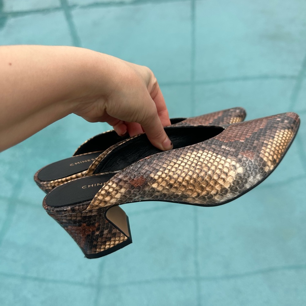 Snakeskin pointy toe slip on mules